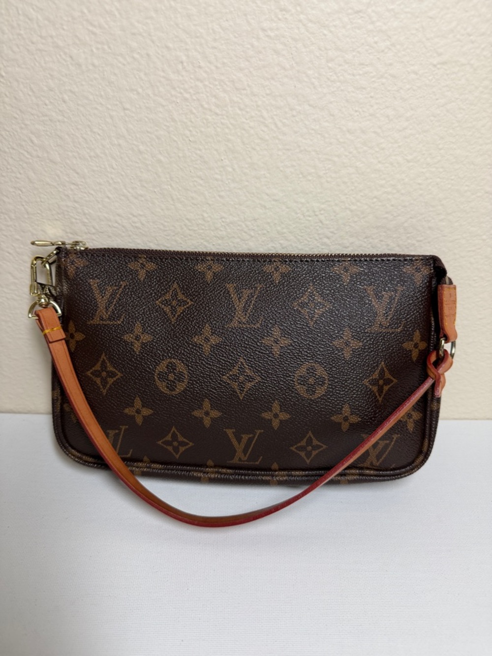 Pochette bag with Vachetta Strap